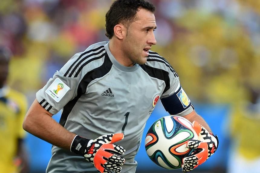 Colombia's goalkeeper David Ospina clears the ball during a Group C football match between Japan and Colombia at the Pantanal Arena in Cuiaba during the 2014 FIFA World Cup on June 24, 2014.&nbsp;&nbsp;English Premier League side Arsenal said on Sund