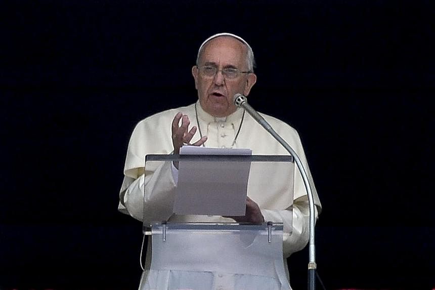 Pope Francis made an emotional plea for peace on Sunday, July 27, 2014, in an impromptu addition to comments delivered at his weekly Angelus address in Saint Peter's Square. -- PHOTO: AFP&nbsp;