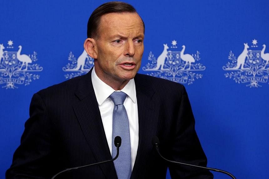 Russian President Vladimir Putin and Australian Prime Minister Tony Abbott (above) on Saturday discussed how an international probe could be set up into the downing of Malaysian Airlines flight MH17 in Ukraine, in which 28 Australians were killed. --