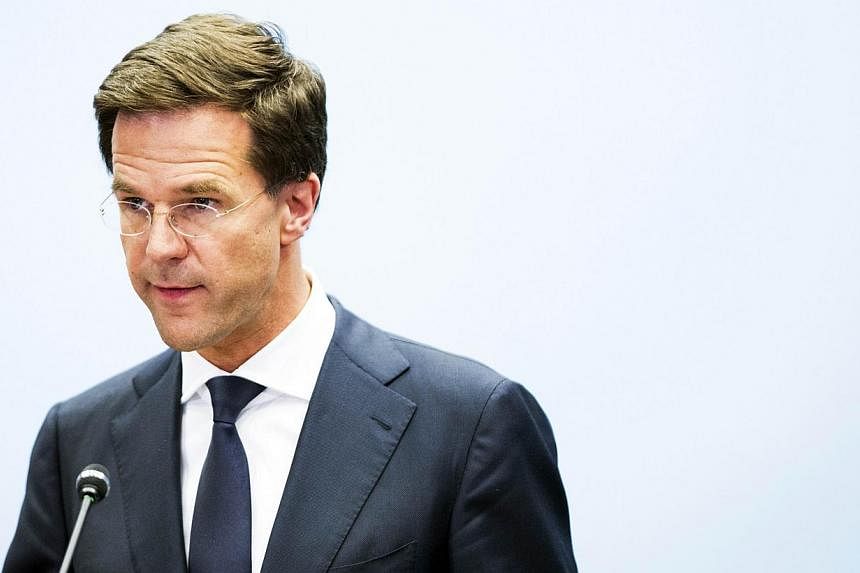 Dutch Prime Minister Mark Rutte addresses the press in The Hague, the Netherlands, on July 24, 2014, regarding Malaysia Airlines flight MH17 which crashed in eastern Ukraine. -- FILE PHOTO: AFP