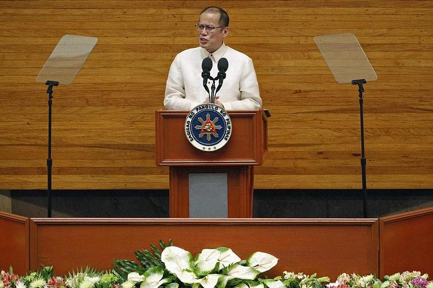 Philippine President Benigno Aquino delivers his fifth State of the Nation Address (SONA) during the joint session of the 16th Congress at the House of Representatives of the Philippines in Quezon city, metro Manila on Monday, July 28, 2014.&nbsp;Phi