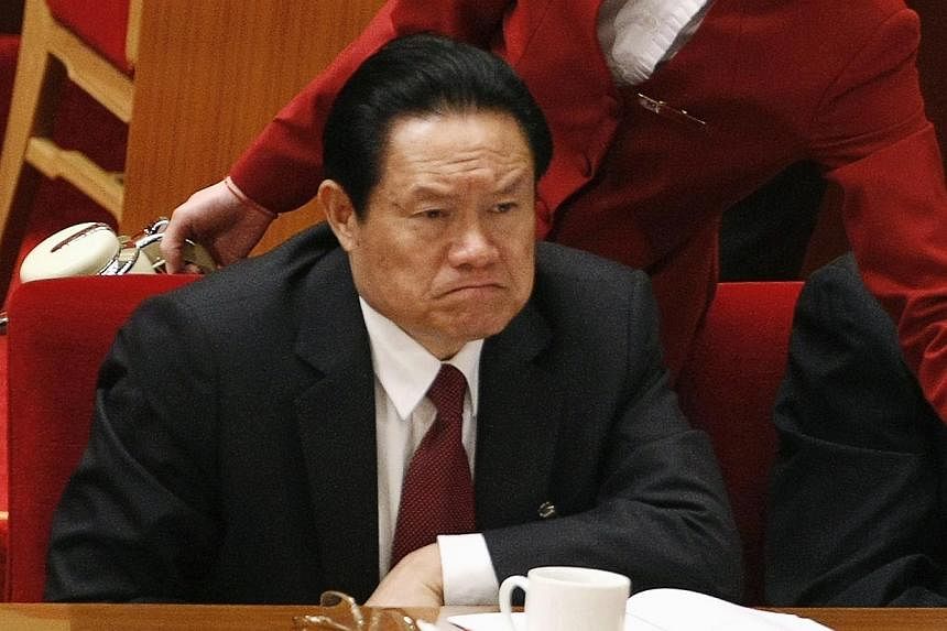 China's then Public Security Minister Zhou Yongkang attends the opening ceremony of the 17th National Congress of the Communist Party of China at the Great Hall of the People, in Beijing in this October 15, 2007 file photo.&nbsp;Embattled former top 