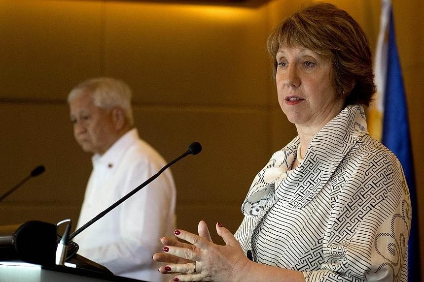 Vice president of the European Commission (EC) and high representative of the European Union (EU) for foreign affairs and security policy, Catherine Ashton (rght), speaks during a press conference with Philippine Foreign Affairs Secretary Albert Del 