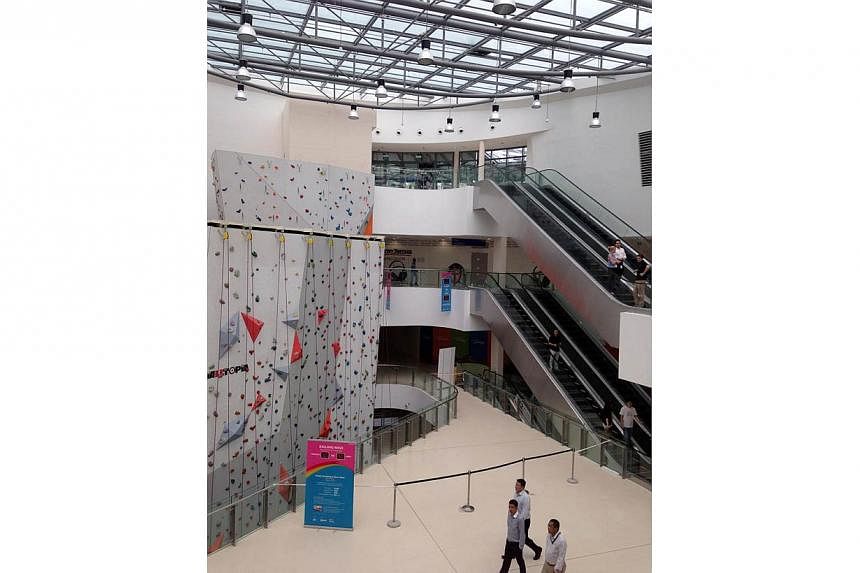 Climbing activities at the indoor rock-climbing wall in Kallang Wave Mall have been suspended. This is believed to be due to cracks in the glass ceiling just above the facility.&nbsp;-- ST PHOTO: JAMIE KOH