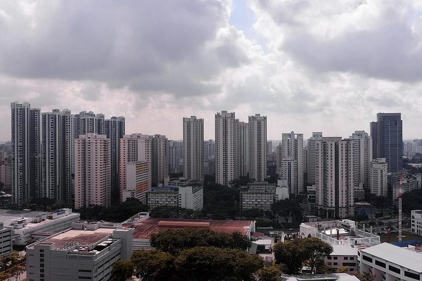 Resale prices of private homes reverted to their declining trend last month, falling 1 per cent from May, according to the latest Singapore Residential Price Index (SRPI) released on Tuesday.&nbsp;-- PHOTO: ST FILE