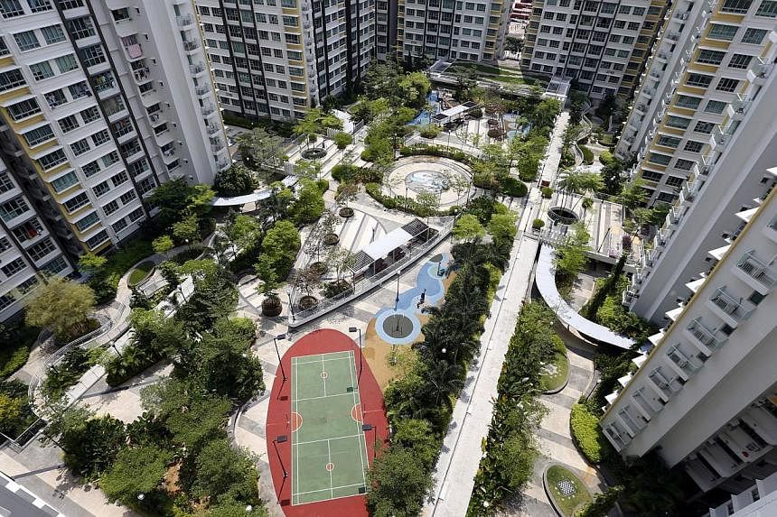 The green and red rooftop "carpet" in Toa Payoh West (above) is made up of small, interlocking plastic trays - a system developed by the HDB itself. This rooftop is not accessible to the public, but some, such as the one in Punggol Place (below), inc