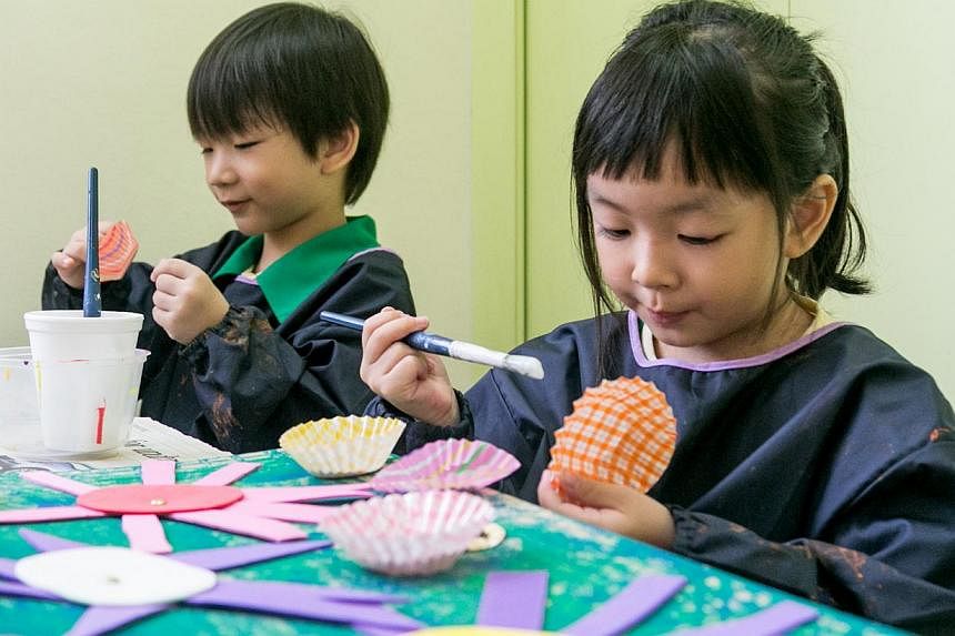 At Nafa Arts Kindergarten, children have an hour of lessons each day on topics such as music, dance, art and drama. -- PHOTO: NANYANG ACADEMY OF FINE ARTS