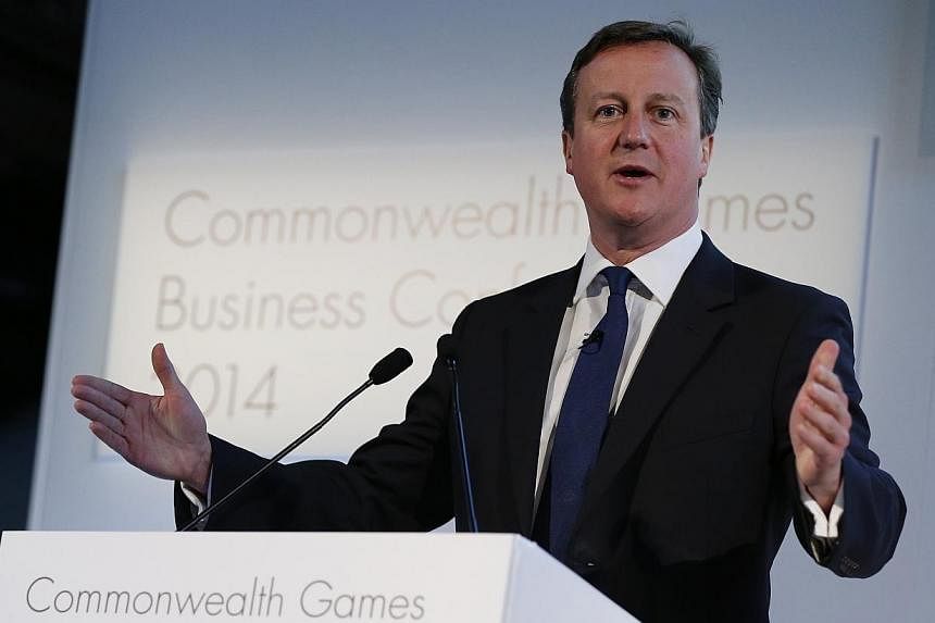 Britain's Prime Minister David Cameron speaks at the Commonwealth Games Business Conference in Glasgow, Scotland, July 23, 2014. Britain's prime minister announced new measures to cut immigration on Tuesday in a bid to lure voters from eurosceptic ri