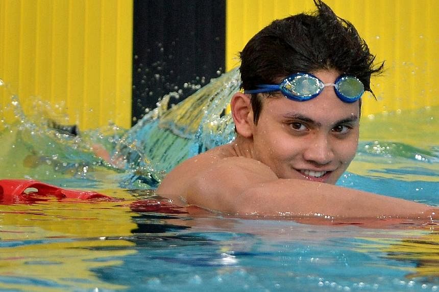 Joseph Schooling at the men's 100m butterfly event on July 27, 2014.&nbsp;Years of hard work had boiled down to an outburst of explosive energy as Joseph Schooling powered his way into Singapore sports history by winning the country's first-ever swim