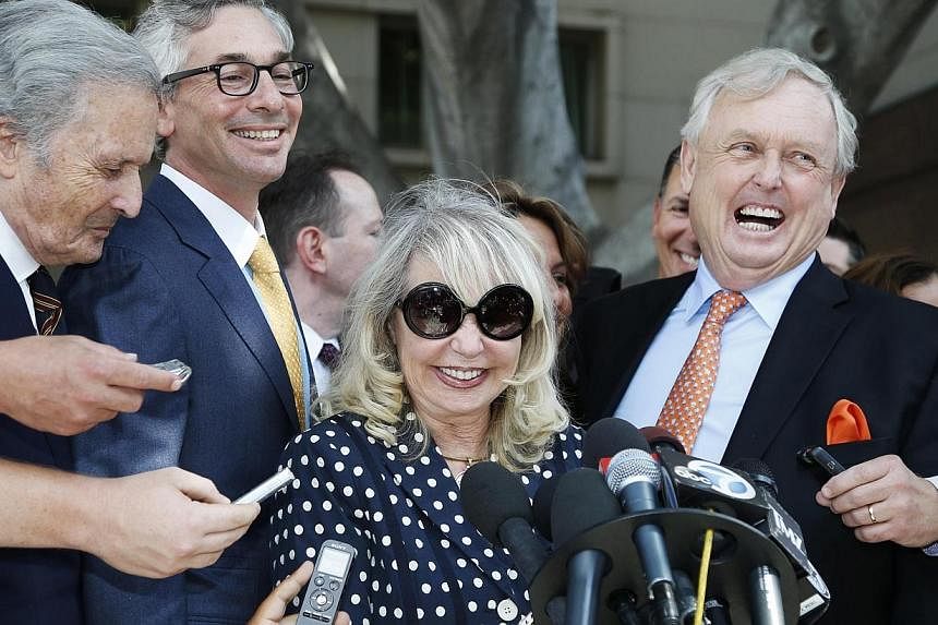Shelly Sterling, 79, (2nd right) speaks at a news conference with her lawyer Pierce O'Donnell (right) and Steve Ballmer's lawyer Adam Streisand (2nd left) in Los Angeles, California on July 28, 2014.&nbsp;A US judge on Monday gave the go-ahead for th