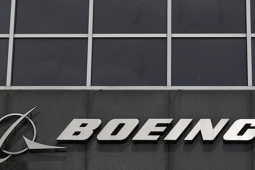 The Boeing logo is seen at their headquarters in Chicago, in this file photo taken on April 24, 2013. Boeing said about 533,000 new commercial pilots would be needed worldwide in the next two decades to cater to a growing global fleet. -- PHOTO: REUT