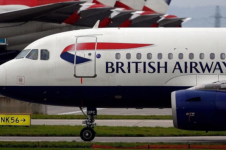 A British Airways aircraft taxis past a row of British Airways jets at Terminal 5 of Heathrow airport in London, UK on Friday, Nov 5, 2010.&nbsp;Girls and young women who allege they were sexually abused by a British Airways (BA) pilot in African sch