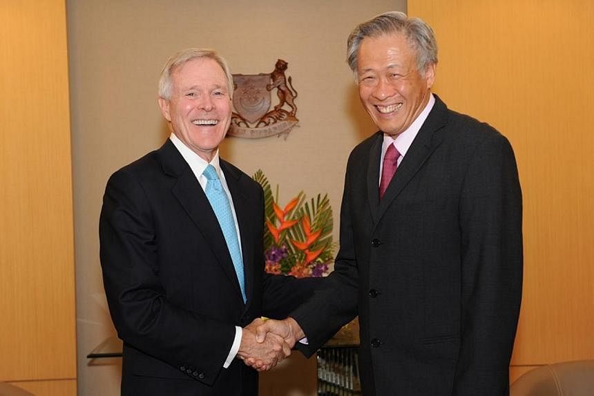 US Navy Secretary Raymond Mabus (left) calling on Defence Minister Ng Eng Hen at the Ministry of Defence on Wednesday, July 30, 2014. -- PHOTO: MINDEF&nbsp;