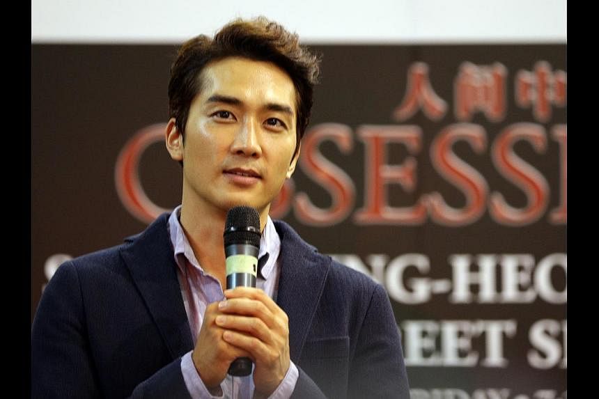 South Korean actor Song Seung Heon in Singapore on July 25, 2014 to promote his movie, Obsessed.&nbsp;&nbsp;-- ST PHOTO: CHEW SENG KIM