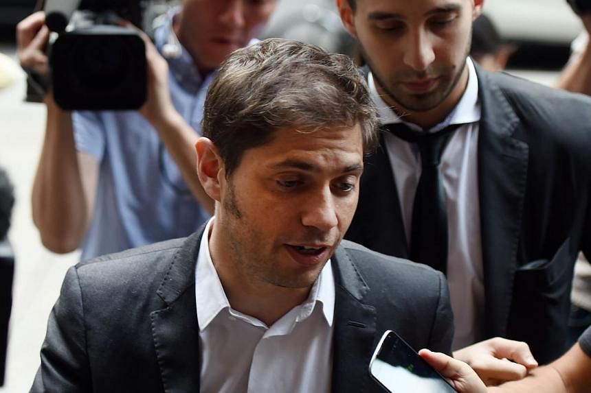 Argentina's Economy Minister Axel Kicillof arrives at the offices of mediator Daniel Pollack July 29, 2014 in New York.&nbsp;Argentina's economy minister flew into New York on Tuesday for last-ditch talks to resolve a dispute with hedge fund creditor