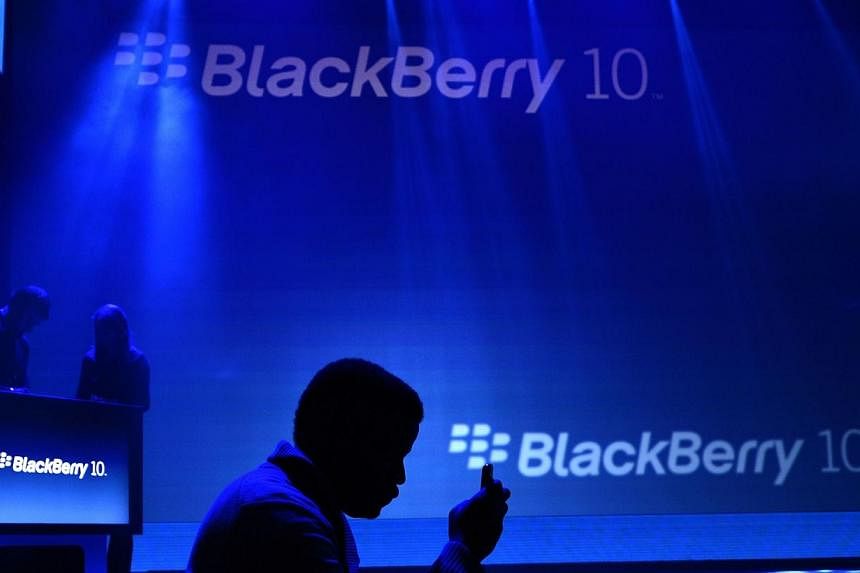 Members of the media attend the unveiling of the BlackBerry 10 mobile platformand new devices in New York City on&nbsp;Jan 30, 2013. BlackBerry is buying a privately held German firm that specialises in voice and data encryption, it said on Tuesday, 