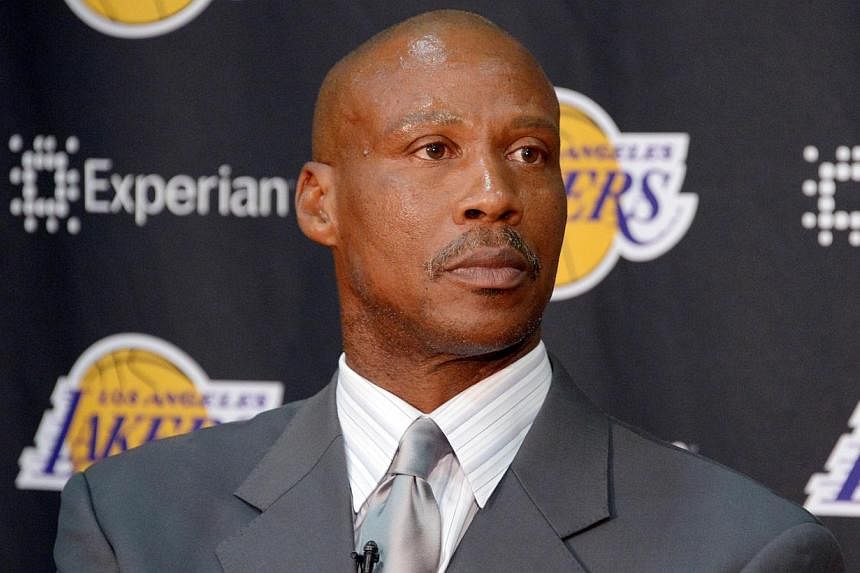 With three Los Angeles Lakers greats looking on, newly appointed head coach Byron Scott pledged on Tuesday to make defence his top priority as he bids to revive the flagging fortunes of one of the NBA's most storied franchises. -- PHOTO: REUTERS