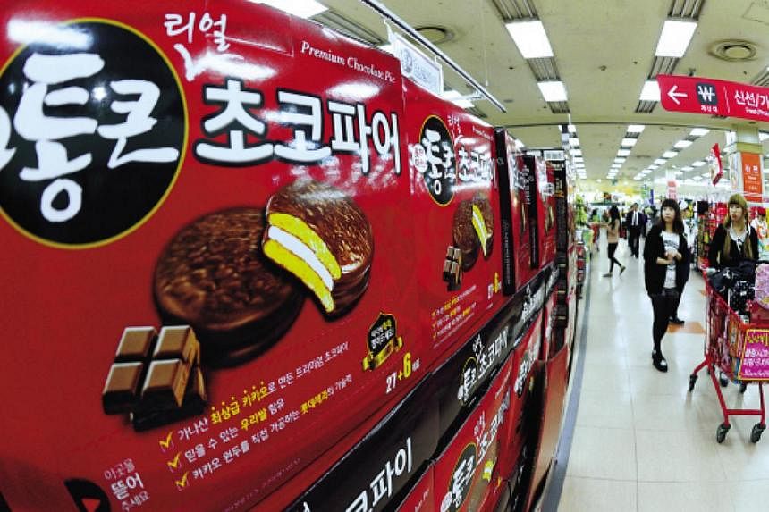 Lotte Mart’s Choco Pies are displayed at a discount store in downtown Seoul. South Korean activists on Wednesday launched balloons across the border with North Korea carrying thousands of Choco Pies - a favoured chocolate snack that has become the 