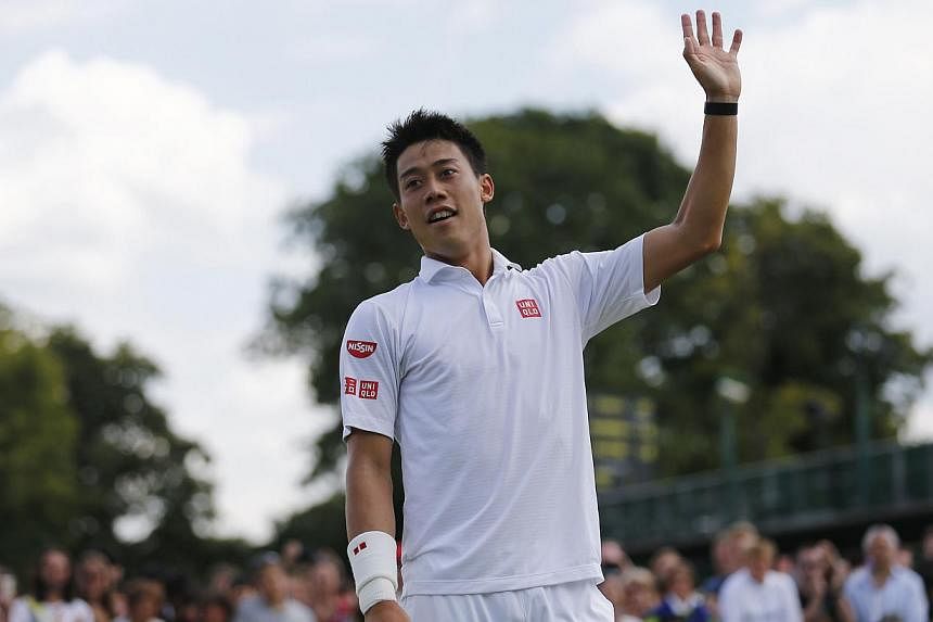 Japan's Kei Nishikori has new confidence against the top stars in tennis, thanks to some success on the court and in his work with coach Michael Chang. -- PHOTO: AFP