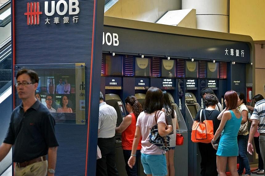Strong contributions from its net interest income and investment gains helped United Overseas Bank (UOB) to log a 3.2 per cent hike in its second quarter net profit to $808 million. -- ST PHOTO:&nbsp;KUA CHEE SIONG