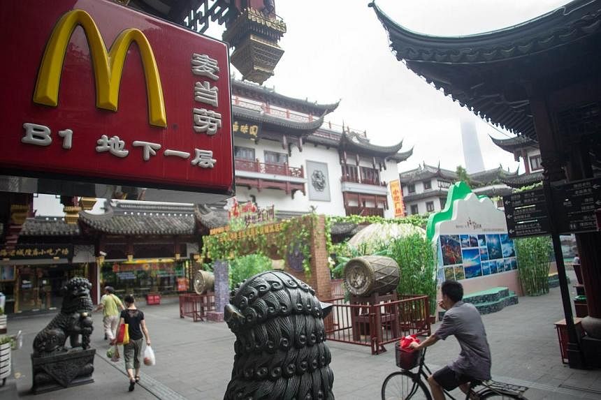 A McDonald's restaurant logo is seen on July 24, 2014 in Shanghai.&nbsp;A food safety scare in China is testing local consumers' loyalty to foreign fast-food brands, including McDonald's Corp and Yum Brands Inc, which owns the KFC and Pizza Hut chain