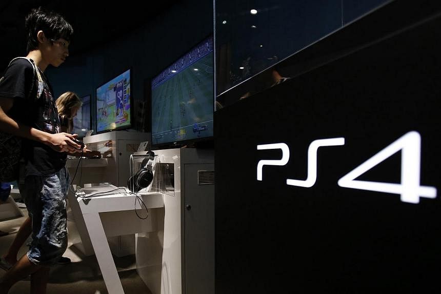 Sony said on Thursday that it posted a US$261 million (S$325 million) quarterly net profit thanks to brisk sales of its PlayStation 4 console and a weak yen, but it still expects a full-year loss. -- PHOTO: REUTERS