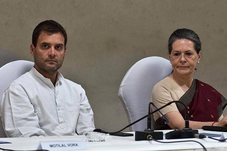Congress party president Sonia Gandhi (right) and vice-president Rahul Gandhi attend the Congress Working Committee (CWC) meeting in New Delhi on May 19, 2014.&nbsp;Mrs Sonia Gandhi's shock decision not to take over as India's prime minister a decade