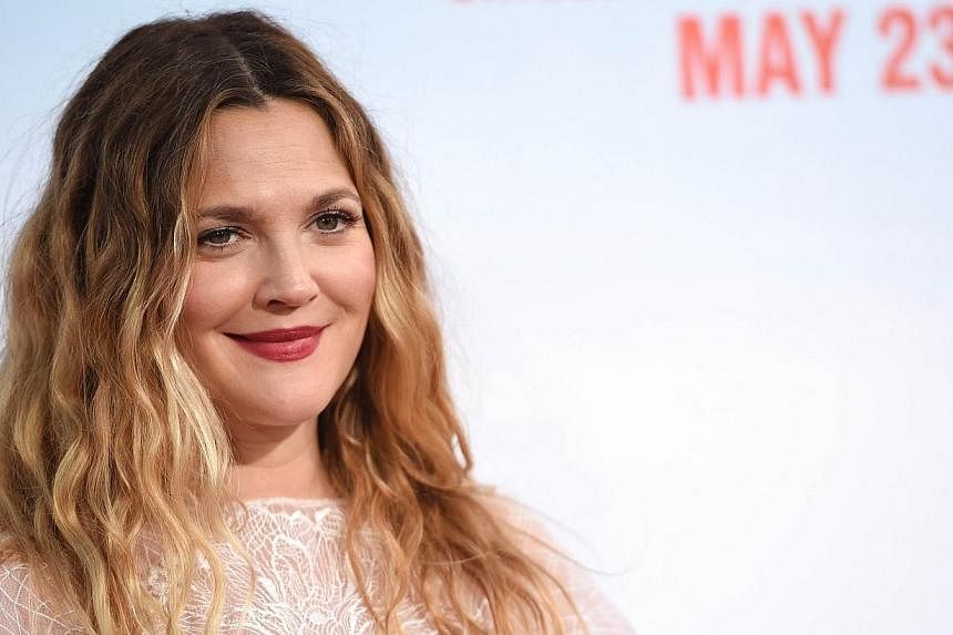 Actress Drew Barrymore's (above) half-sister was found dead in her vehicle parked on a suburban San Diego street, the San Diego County Coroner said on Wednesday. -- PHOTO: AFP