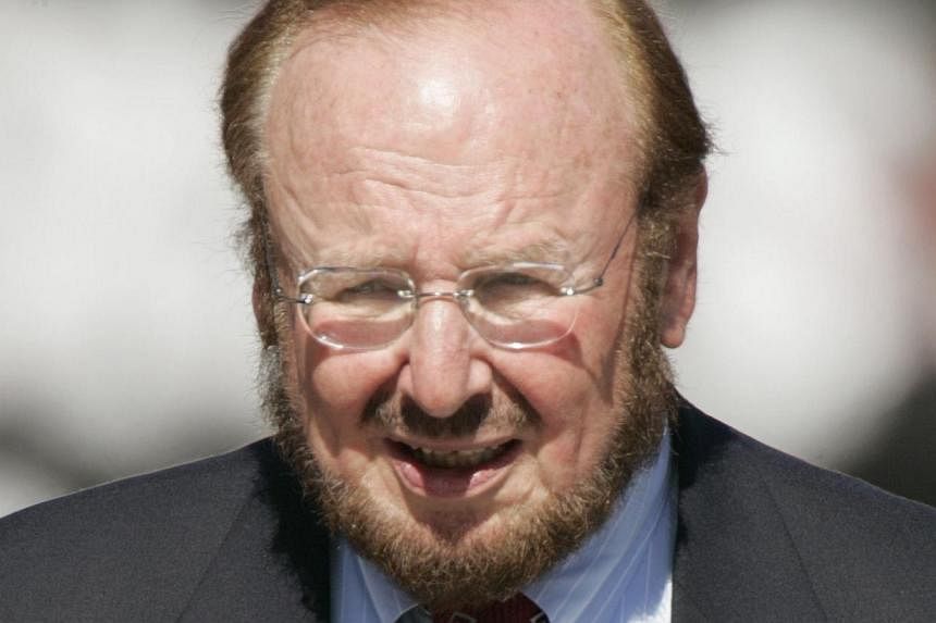 A 21 Nov 2004 file photo shows the late US business tycoon Malcolm Glazer in Tampa Bay, Florida.&nbsp;The Glazer family will make around US$150 million (S$187 million) by selling part of its stake in Manchester United, although the deal will leave th