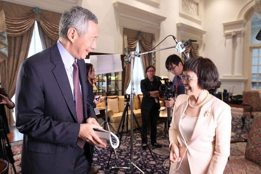 Prime Minister Lee Hsien Loong is seen here with Hu Shuli, one of the winners of this year's Magsaysay Award. The&nbsp;61-year-old founder and editor of Caijing, a business magazine famed for its groundbreaking investigative reporting in China, was i