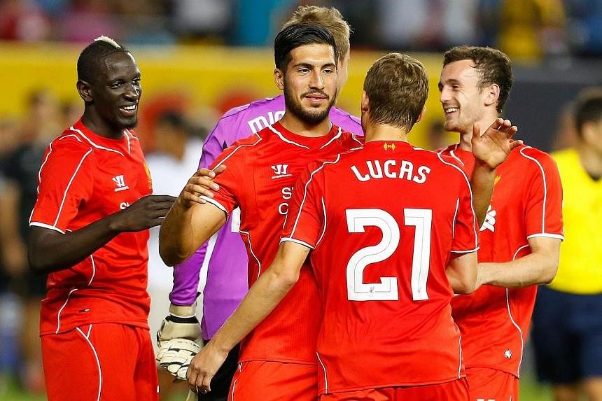 Liverpool celebrates after defeating Manchester City during the International Champions Cup 2014 at Yankee Stadium on July 30, 2014 in the Bronx borough of New York City.&nbsp;Liverpool rallied twice against Manchester City and triumphed 3-2 in a pen