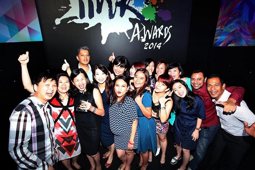 The staff of DDB Group Singapore and DBS Bank who worked together for the “DBS Private Bank” campaign which bagged the top Grand Prix Prize. -- PHOTO: LIANHE ZAOBAO