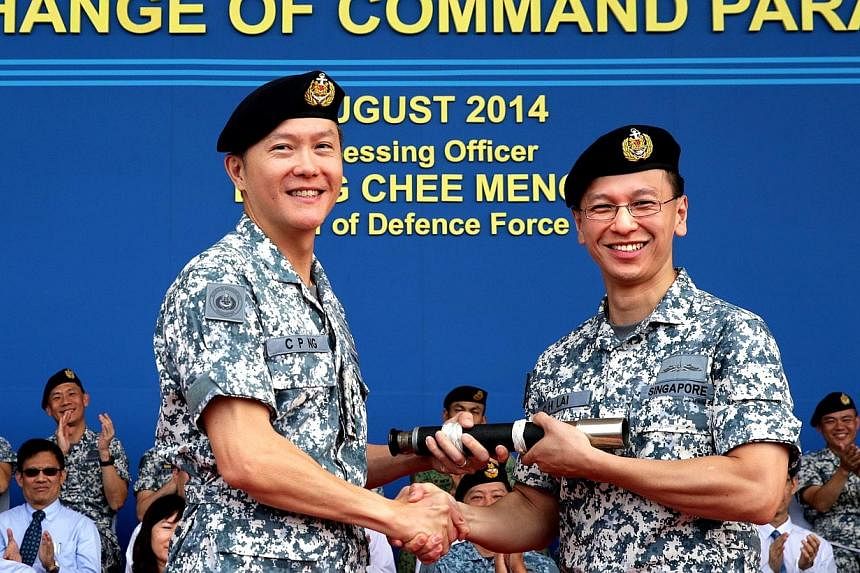 Rear-Admiral Ng Chee Peng (left) handing over command to Rear-Admiral Lai Chung Han.&nbsp;-- ST PHOTO:&nbsp;CHEW SENG KIM