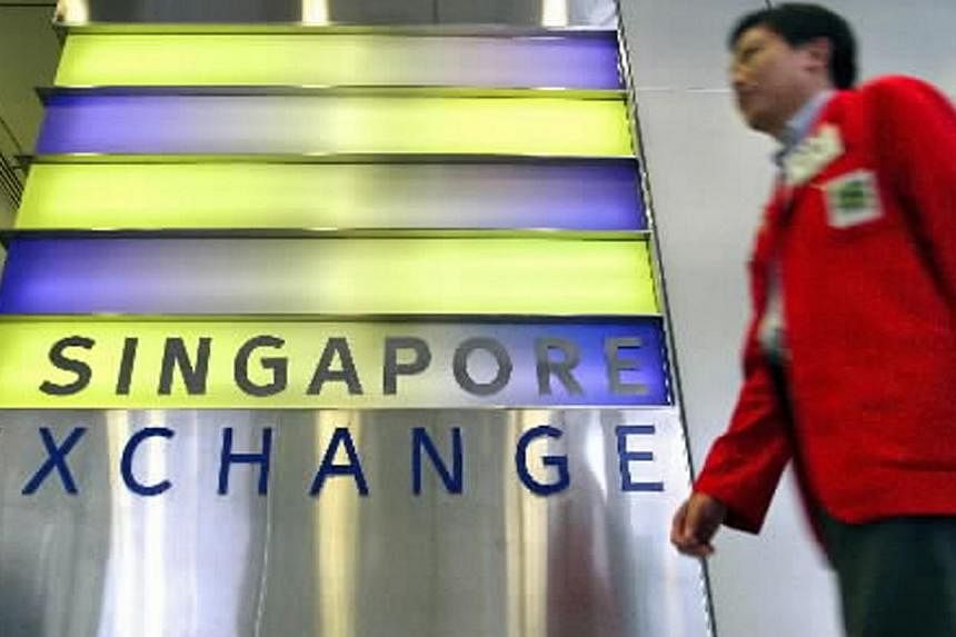 Share trading in Singapore is headed for major changes following a wide-ranging consultation exercise which regulators had with the investment community since February. -- PHOTO: BLOOMBERG