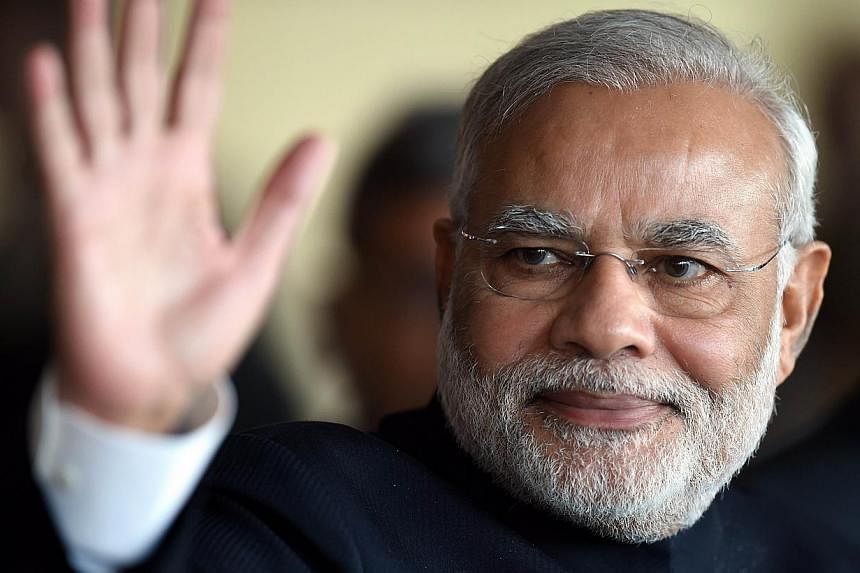 Sri Lanka extended an "unqualified apology" to Indian Prime Minister Narendra Modi on Friday over an article and uncomplimentary illustration of the leader and a regional Tamil politician published on a government website. &nbsp;-- PHOTO: AFP&nbsp;