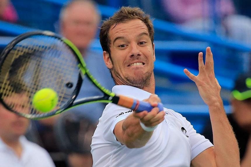 Richard Gasquet of France returns a shot to Kei Nishikori of Japan during the Citi Open at the William H.G. FitzGerald Tennis Center on August 1, 2014 in Washington, DC. -- PHOTO: AFP&nbsp;