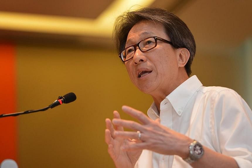A higher re-employment age and a more progressive wage ladder are among ways to improve Singapore's workforce, labour chief Lim Swee Say said on Saturday, Aug 2, 2014, in his National Day message to unionists. -- PHOTO: ST FILE
