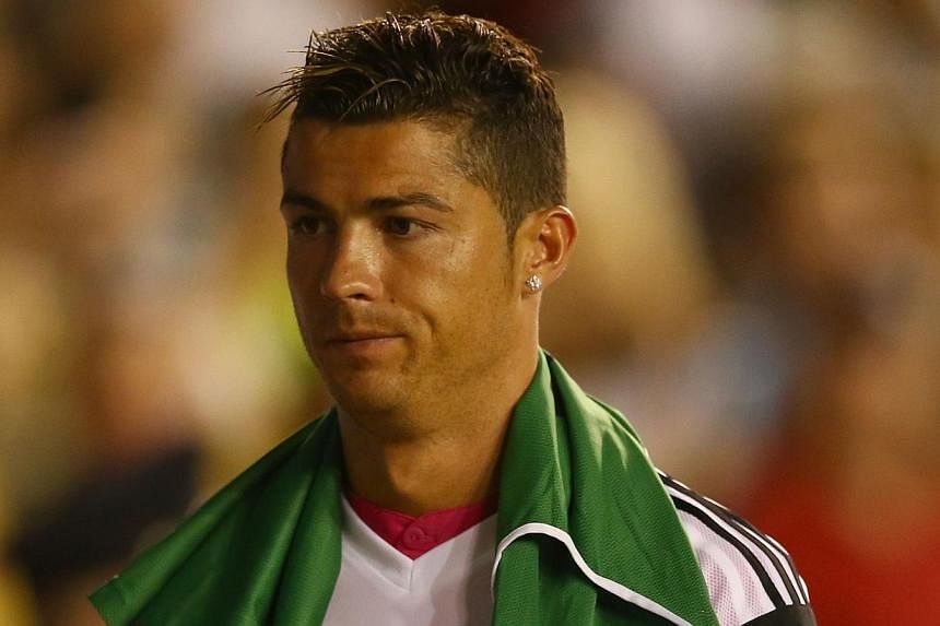 Cristiano Ronaldo of Real Madrid during a Guinness International Champions Cup 2014 game at Cotton Bowl on July 29, 2014 in Dallas, Texas. -- PHOTO: AFP