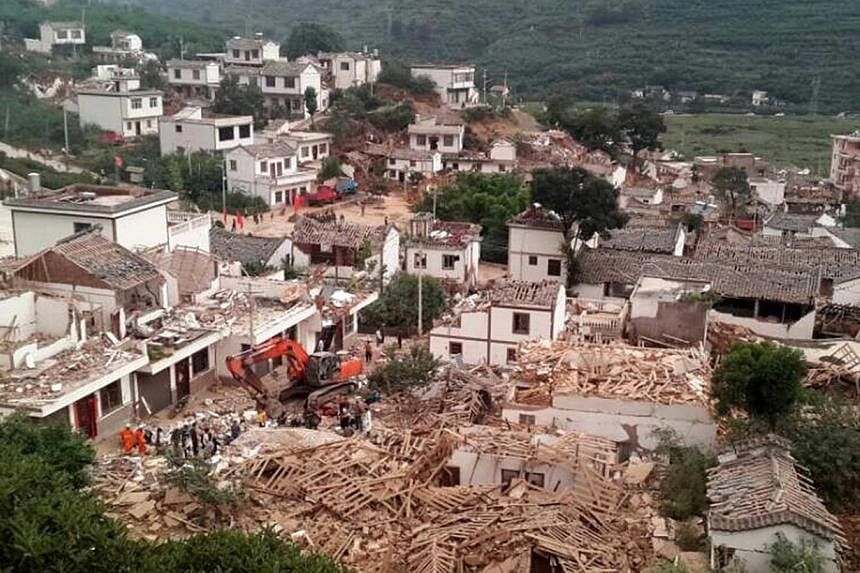 At least 150 people were killed and 1,300 injured after a strong earthquake hit south-west China's mountainous Yunnan province on Sunday, Aug 3, 2014, state media said. -- PHOTO: REUTERS