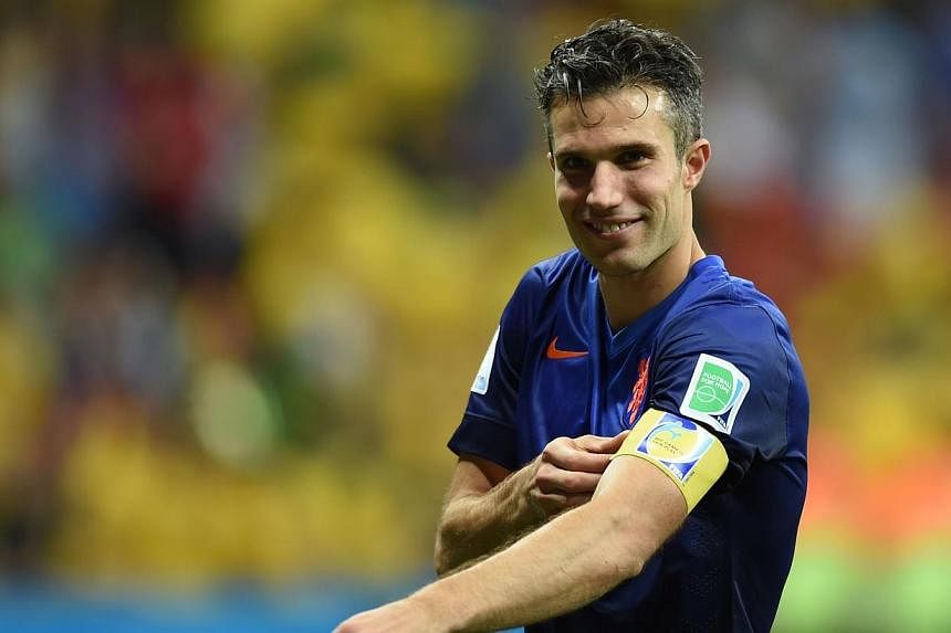 Netherlands' forward and captain Robin van Persie reacts at the end of the third place play-off football match between Brazil and Netherlands during the 2014 FIFA World Cup at the National Stadium in Brasilia on July 12, 2014.&nbsp;Dutch striker Robi