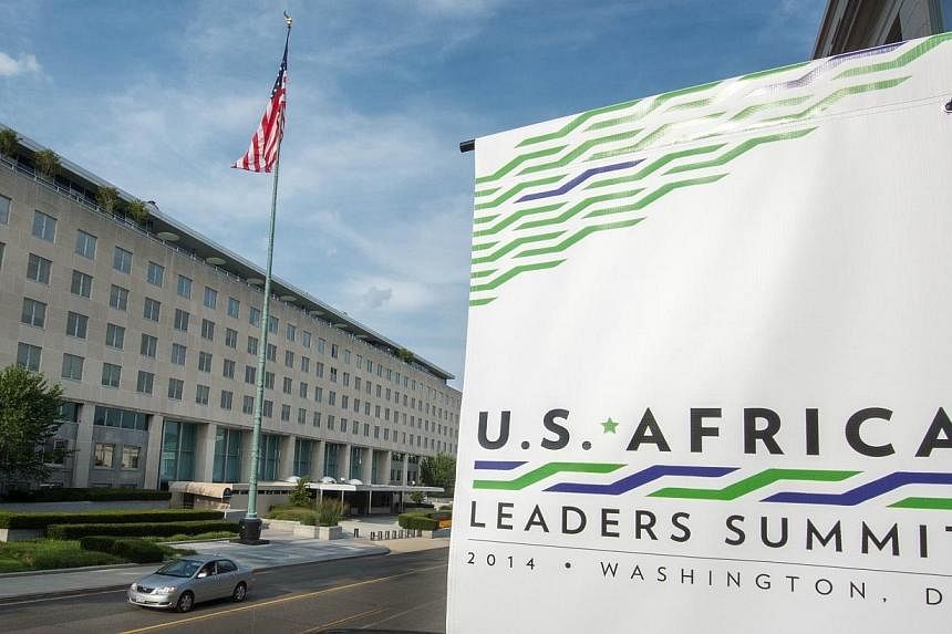 A sign is seen promoting the US-Africa Summit is seen July 31, 2014 outside the US Department of State (left) whereUS President Barack Obama will host African Leaders August 4-6,2014 in Washington, DC.&nbsp;African leaders head to Washington for a la