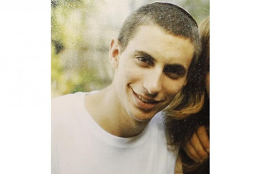 Israeli soldier Hadar Goldin is seen in this undated family handout provided on Aug 2, 2014. The Israeli army on Sunday announced the death of Hadar Goldin, the Israeli soldier who went missing in action during fighting in the Gaza Strip two days ago