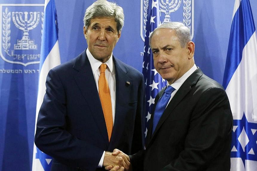US Secretary of State John Kerry (left) meets with Israeli Prime Minister Benjamin Netanyahu in Tel Aviv on July 23, 2014.&nbsp;Israel eavesdropped on US Secretary of State John Kerry during doomed peace talks with the Palestinians last year, German 