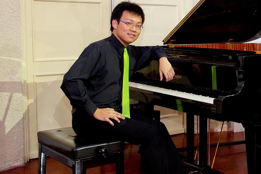 Pianist Thomas Ang showed his skill during his recital, masterfully performing pieces despite the rumbles coming from the National Day Parade preview that was being held nearby. -- PHOTO:&nbsp;PATRICK ANG