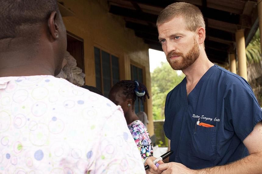This undated handout photo obtained July 30, 2014 courtesy of Samaritan's Purse shows Dr. Kent Brantly near Monrovia, Liberia. -- PHOTO: AFP