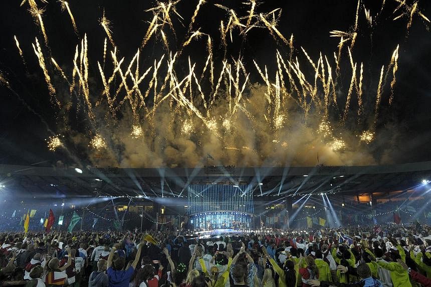 Fireworks light up the sky during the closing ceremony of the 2014 Commonwealth Games at Hampden Park in Glasgow, Scotland, on Aug 3, 2014.&nbsp;Hailed as the "best ever" Commonwealth Games, Glasgow 2014 has enthralled live crowds and audiences the w