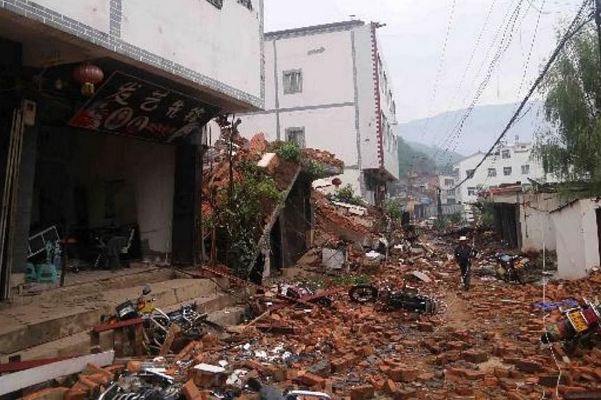 Walls fall off local buildings after a 6.5-magnitude earthquake hit Ludian county in south-west China's Yunnan province on Aug 3, 2014. -- PHOTO: CHINA DAILY/ASIA NEWS NETWORK