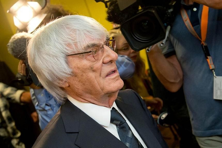 Formula One Chief Executive Bernie Ecclestone leaves the courtroom at the regional court in Munich, southern Germany, on August 5, 2014.&nbsp;A German court on Tuesday halted a bribery trial against Bernie Ecclestone in exchange for his paying a US$1