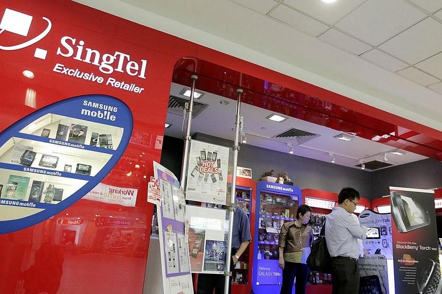 Postpaid mobile customers of SingTel can surf and stream movies to their heart's content on National Day without paying a cent. -- PHOTO: ST FILE