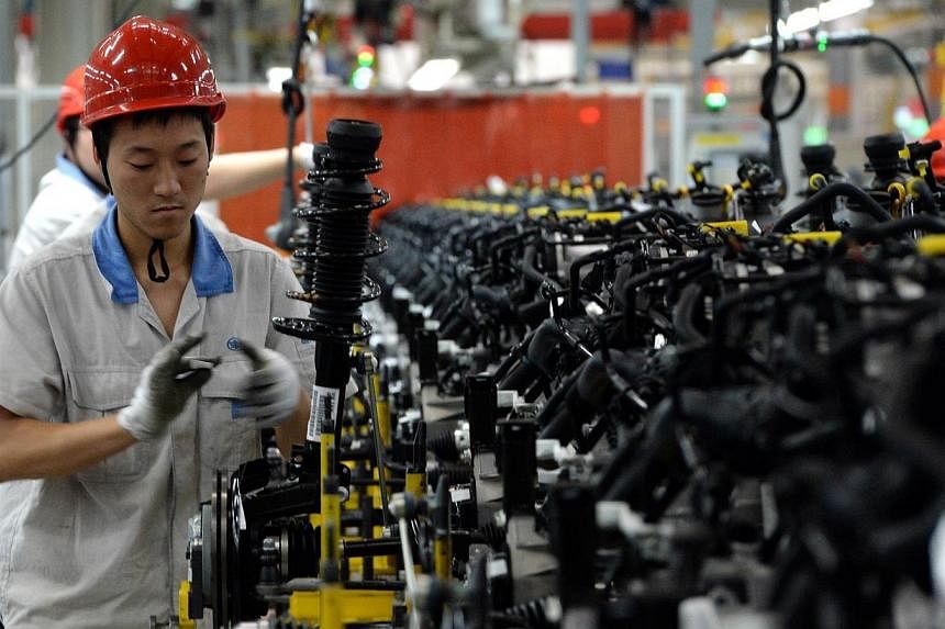 China's cities and provinces raised minimum wages in the first half of 2014 at a rate far outstripping economic growth as the government seeks to support consumption, local media reported on Tuesday, Aug 5, 2014. -- PHOTO: AFP